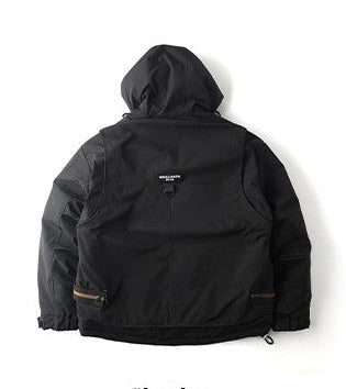 Oversized corduroy hooded down jacket in black and brown colorways with multi-pocket design