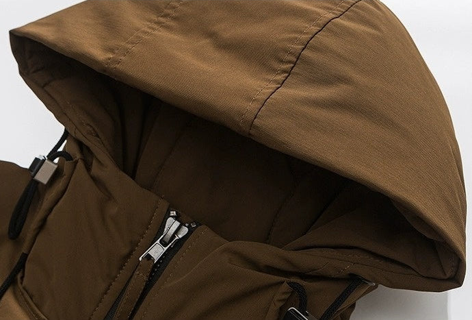 Oversized corduroy hooded down jacket in black and brown colorways with multi-pocket design